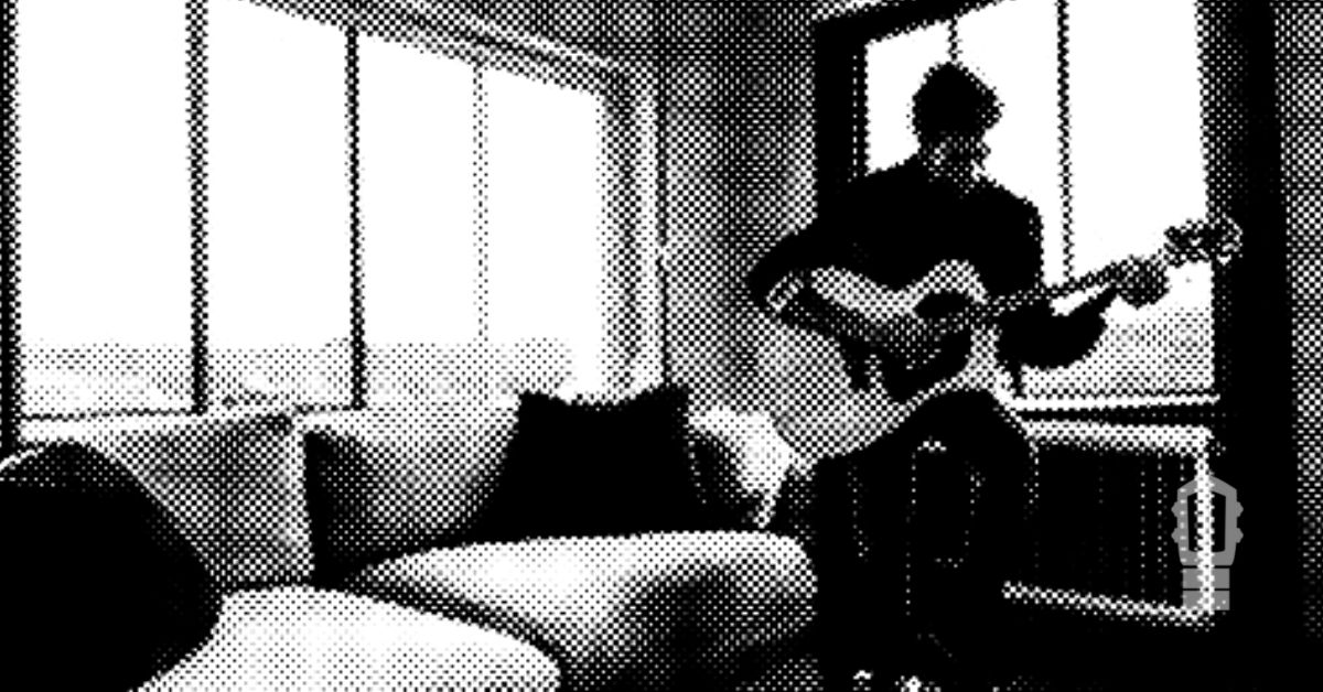 playing guitar at home
